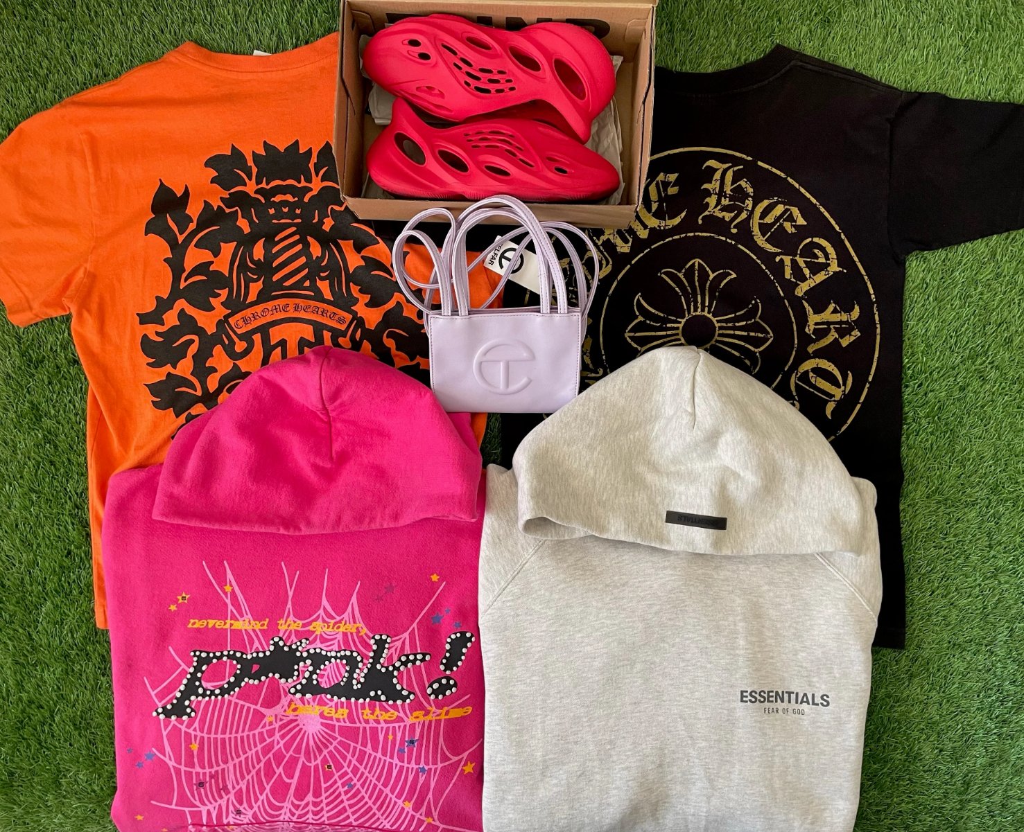 marked down elevate items. chrome hearts, sp5der p*nk, essentials, yeezy foams